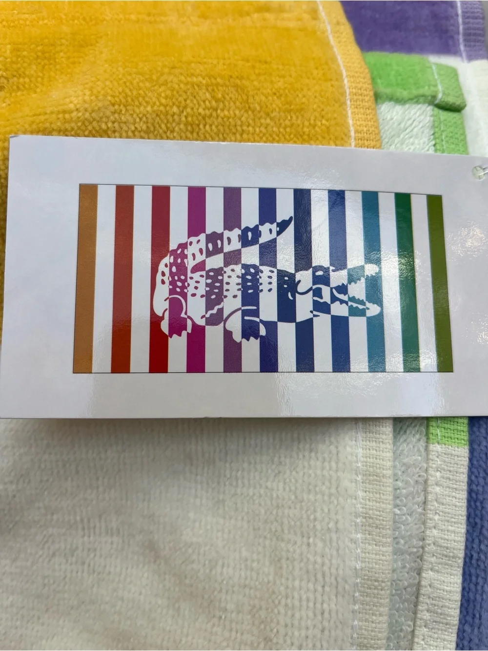 New Lacoste alligator pastel rainbow stripe LBGTQ beach towel.